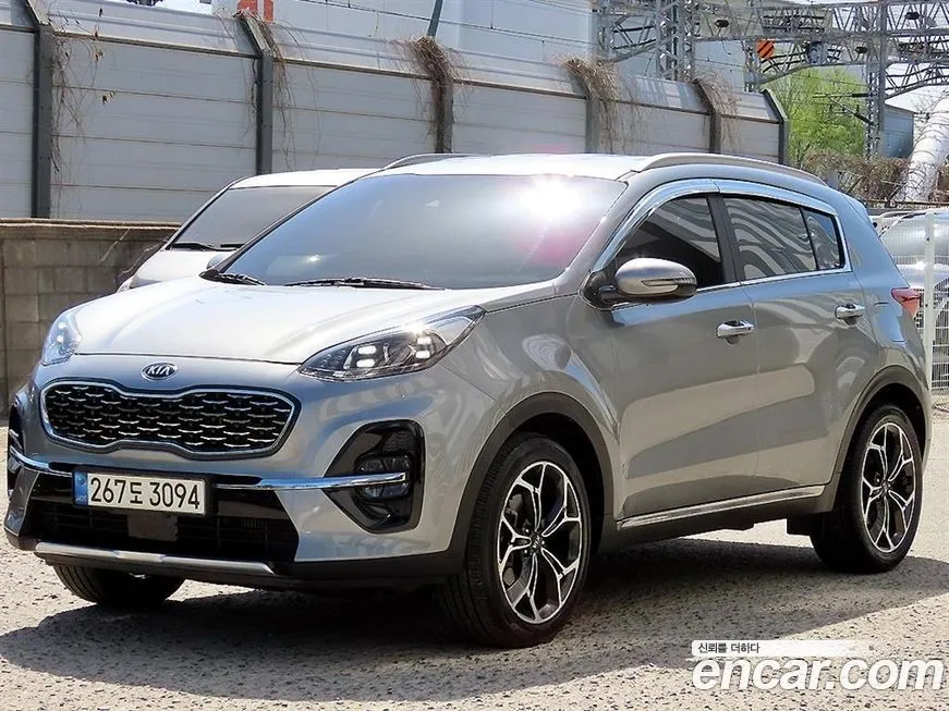 Kia Sportage — фото 10