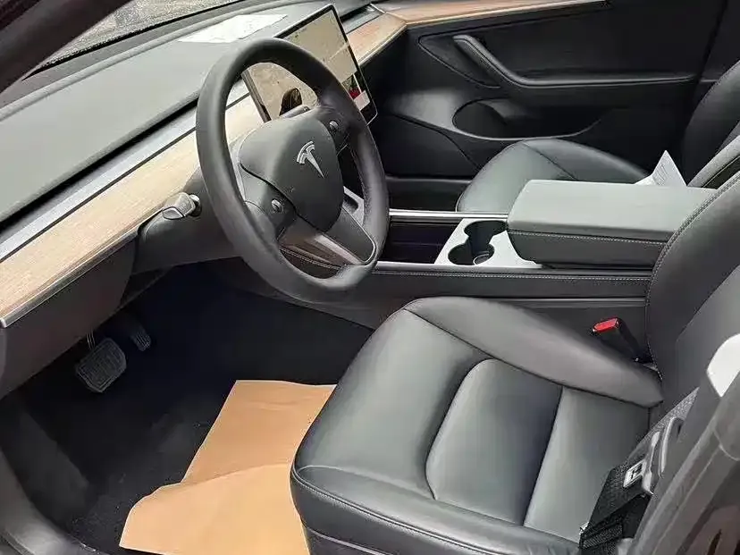 Tesla Model 3 — фото 10