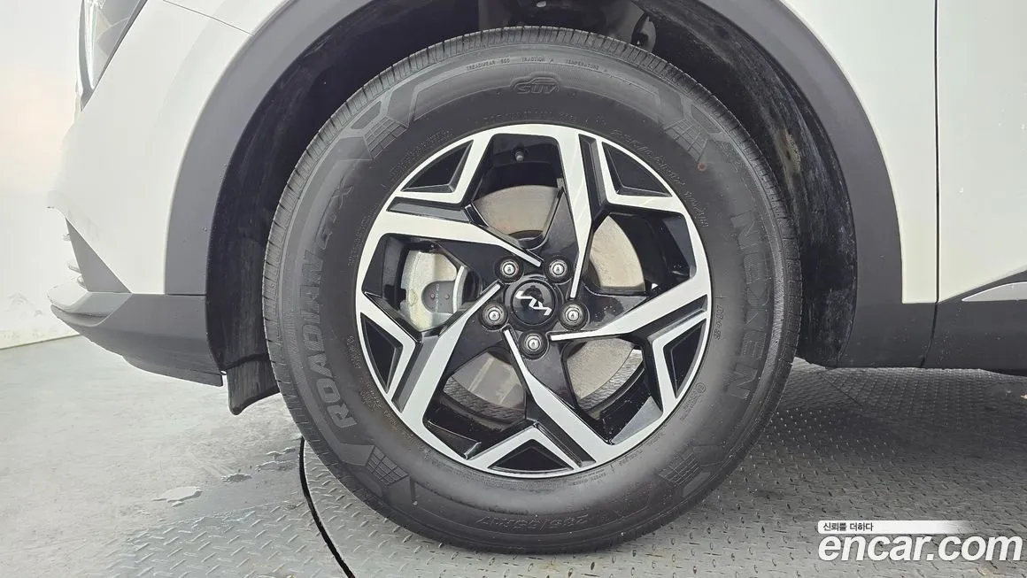 Kia Sportage — фото 10