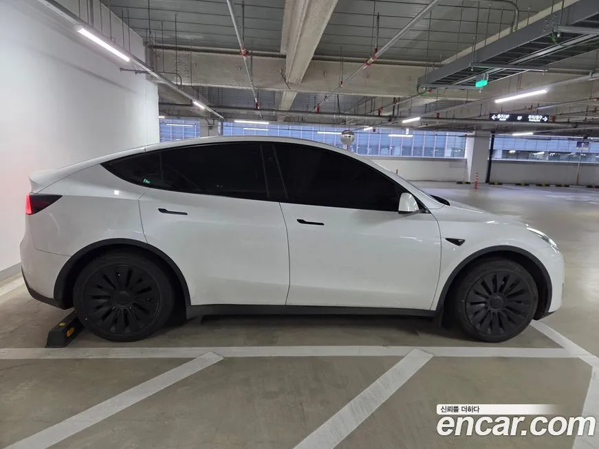 Tesla Model Y — фото 5