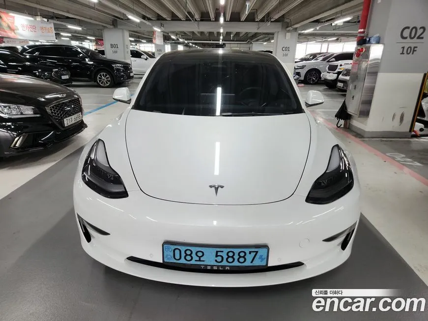 Tesla Model 3 — фото 8