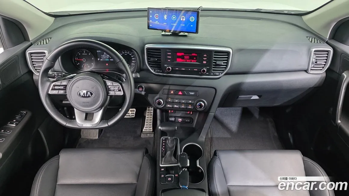 Kia Sportage — фото 8