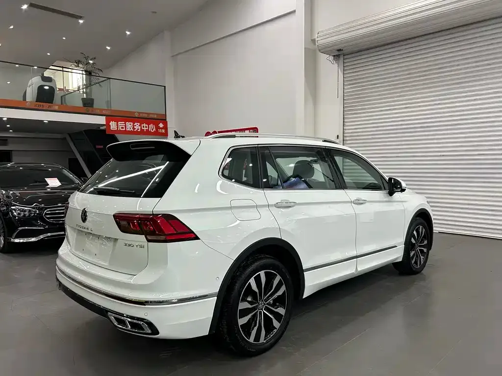 Volkswagen Tiguan L — фото 3