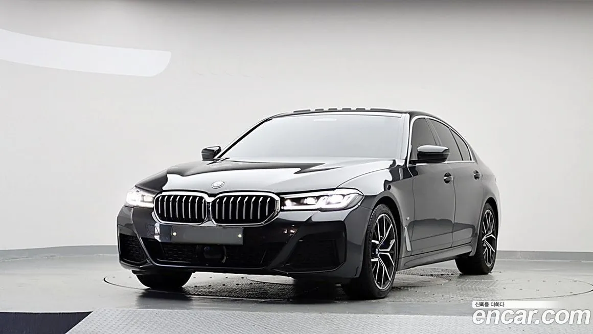BMW 5-Series — фото 1