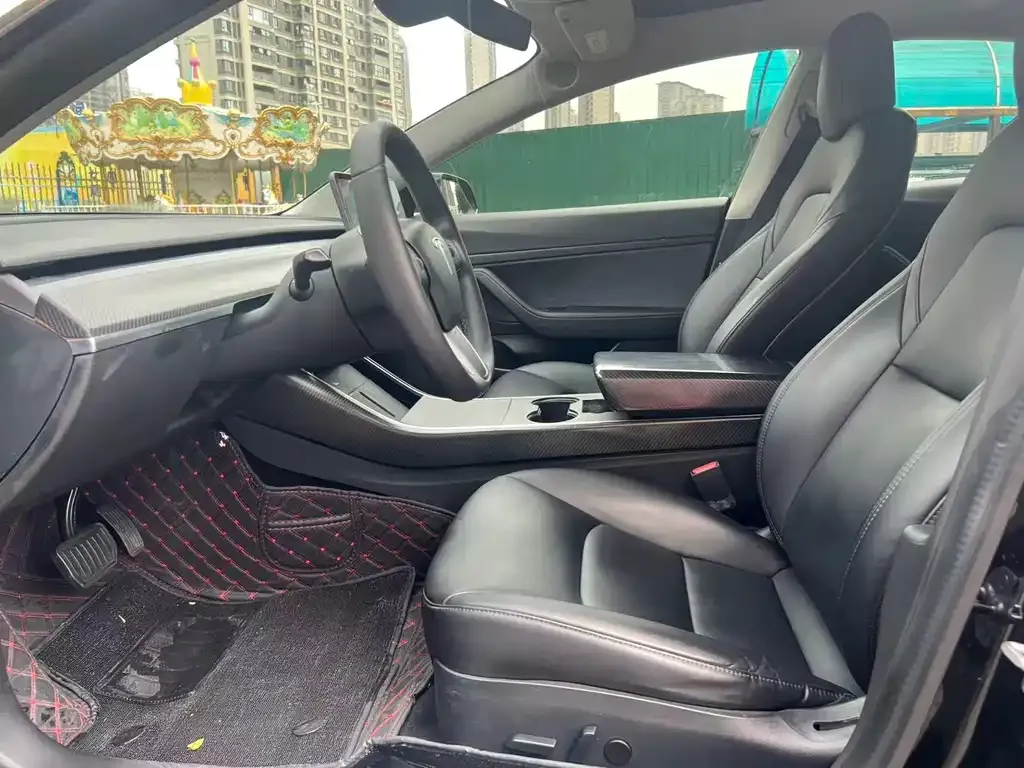 Tesla Model 3 — фото 9