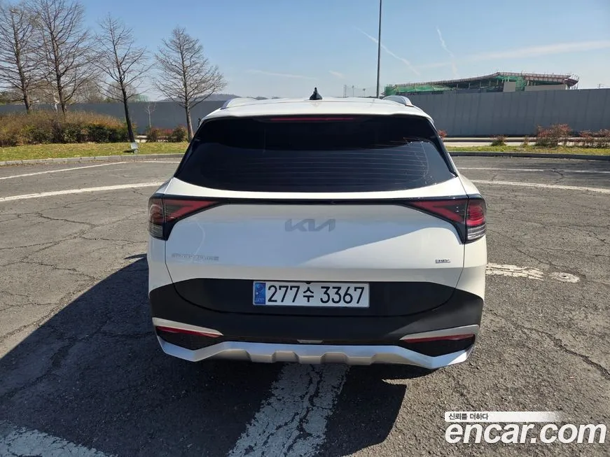 Kia Sportage — фото 7