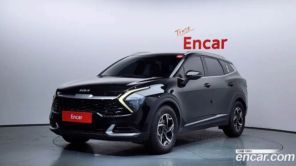 Kia Sportage — фото 1