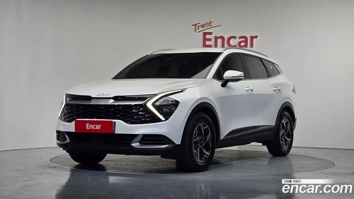 Kia Sportage — фото 1