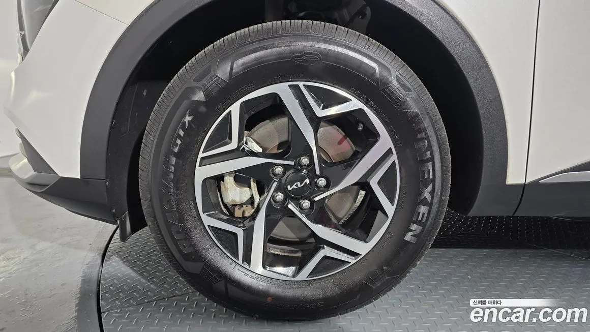 Kia Sportage — фото 10