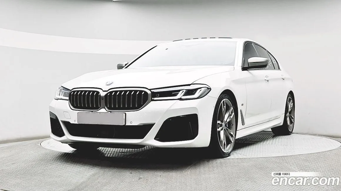 BMW 5-Series — фото 1