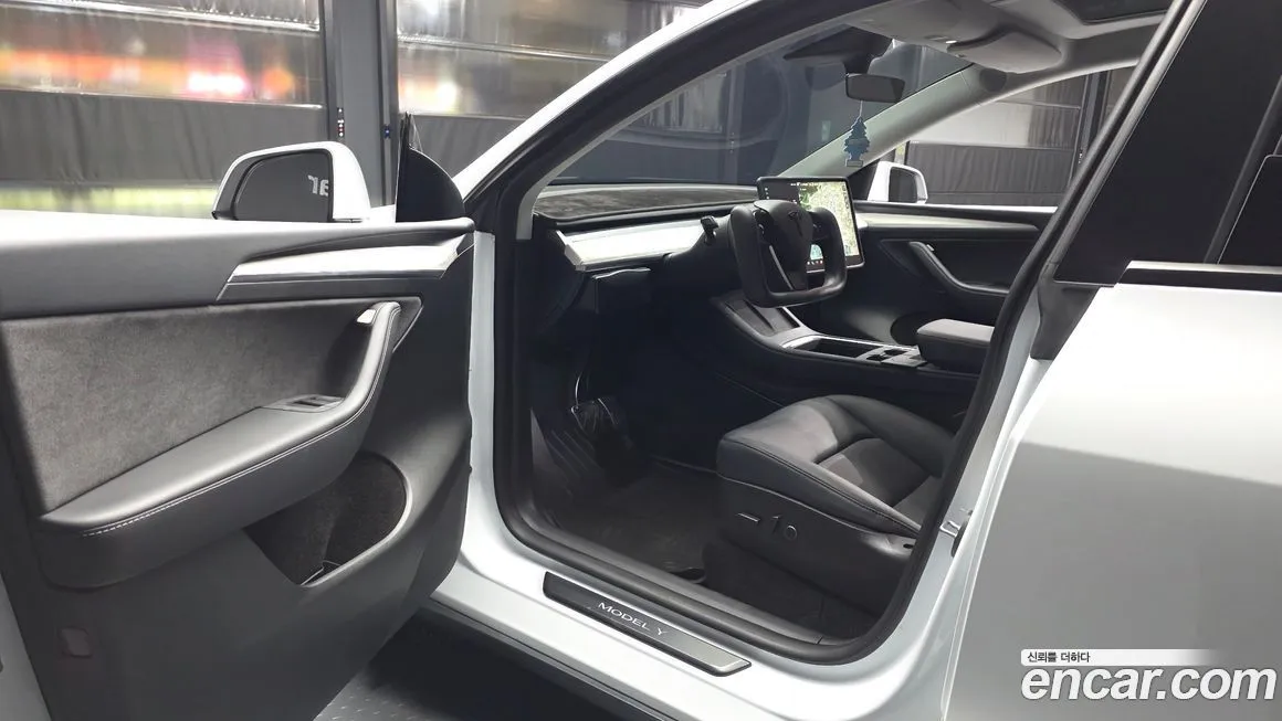 Tesla Model Y — фото 6