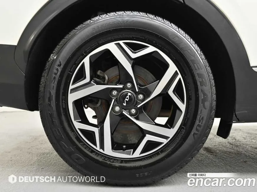 Kia Sportage — фото 10