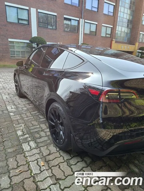 Tesla Model Y — фото 7