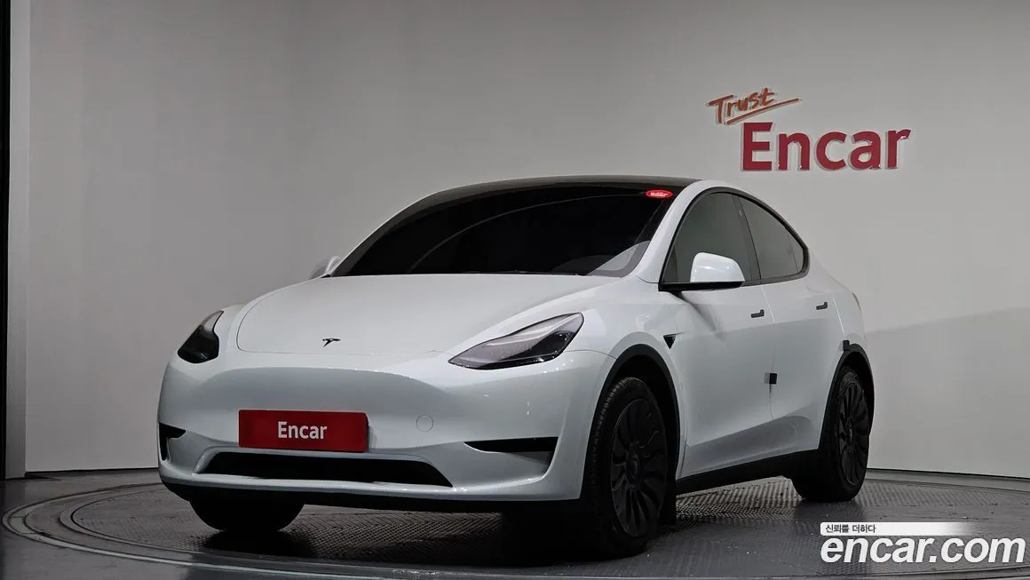 Tesla Model Y — фото 1