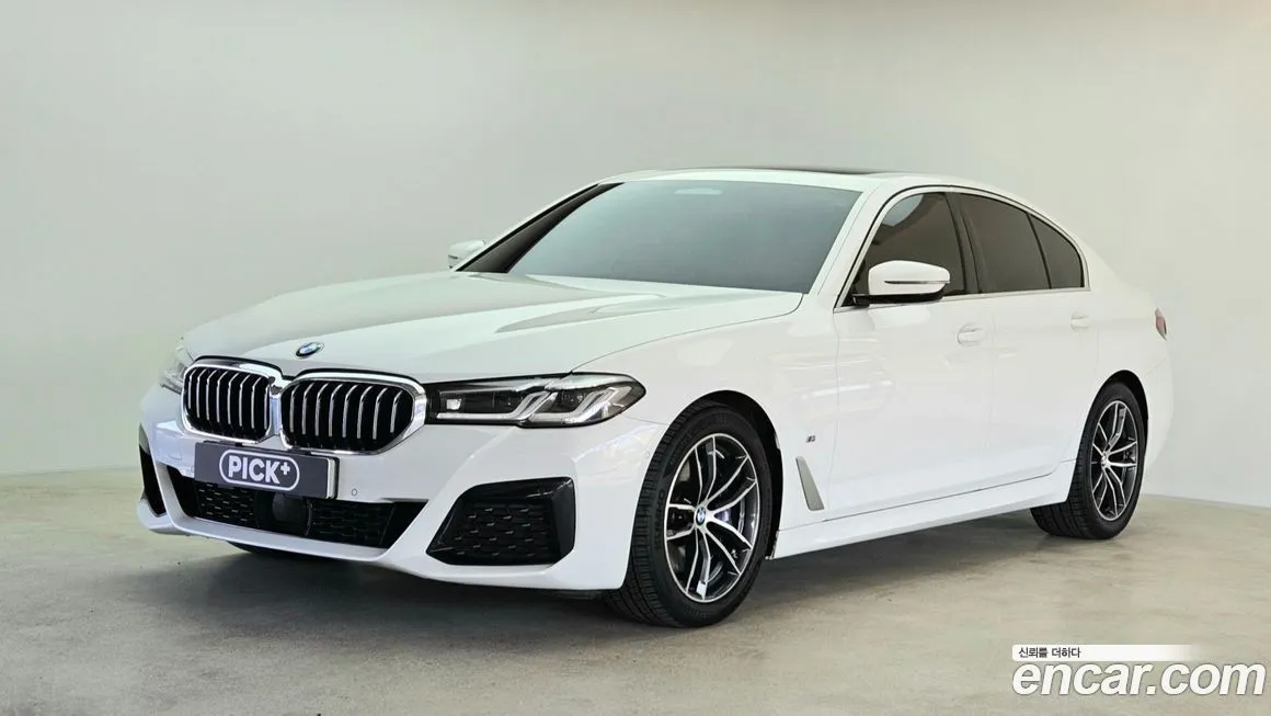 BMW 5-Series — фото 1