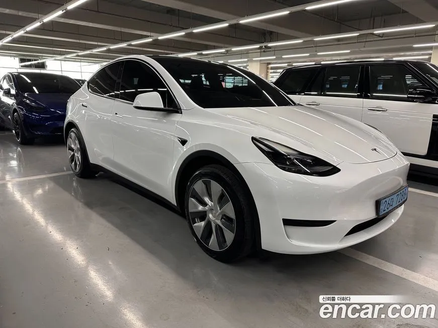 Tesla Model Y 2023 из KR, фото 7