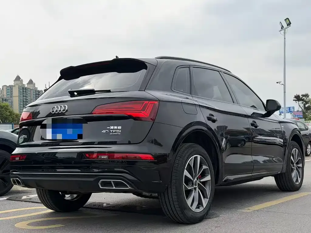 Audi Q5L — фото 5