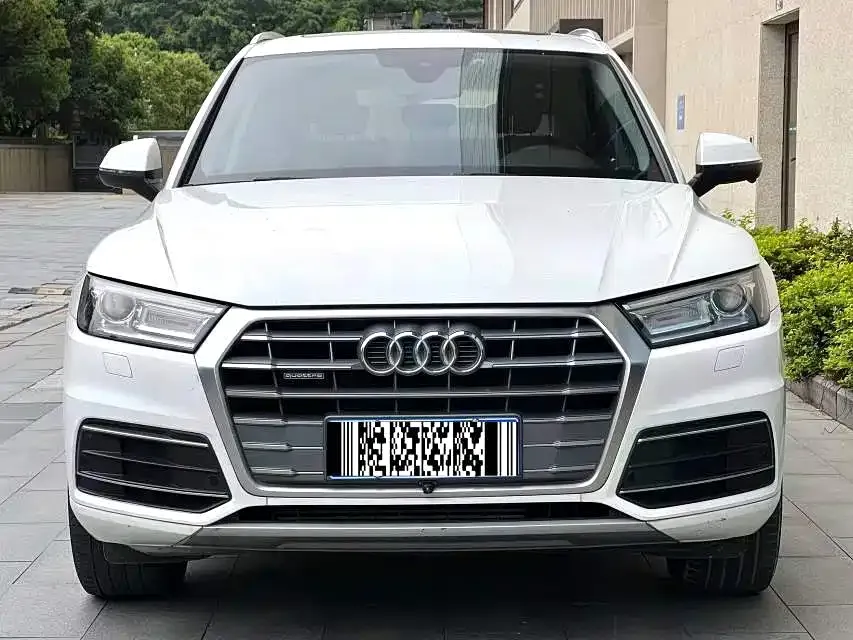 Audi Q5L — фото 6