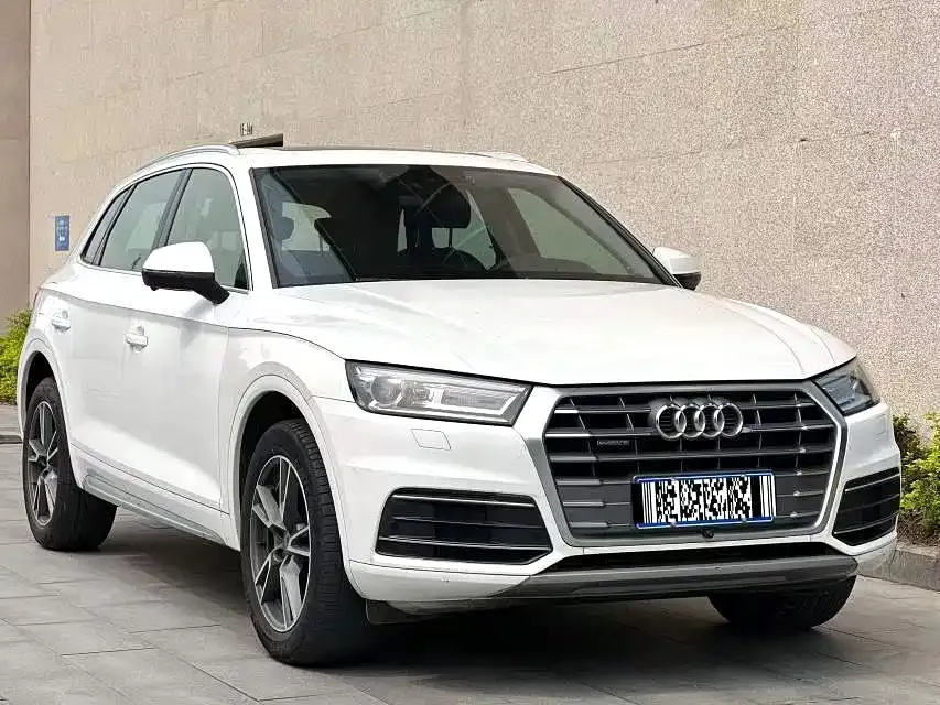 Audi Q5L — фото 7