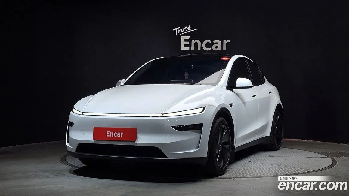 Tesla Model Y — фото 1