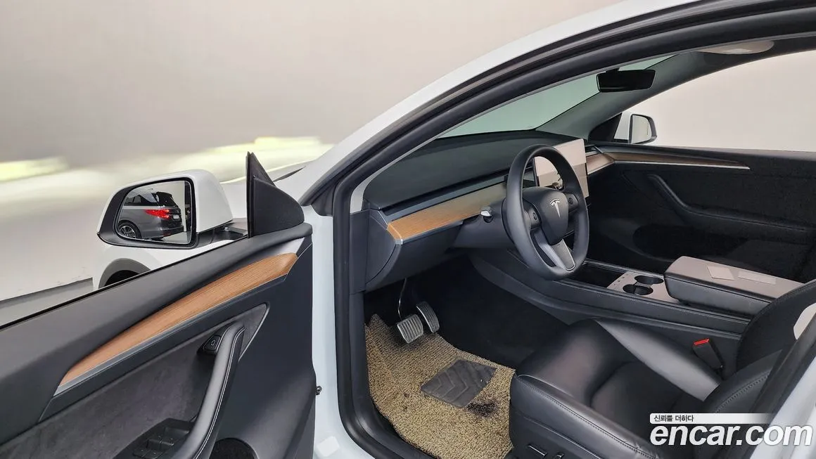 Tesla Model Y — фото 6