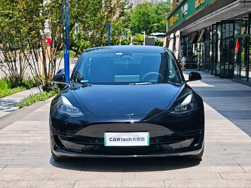 Tesla Model 3 — фото 7