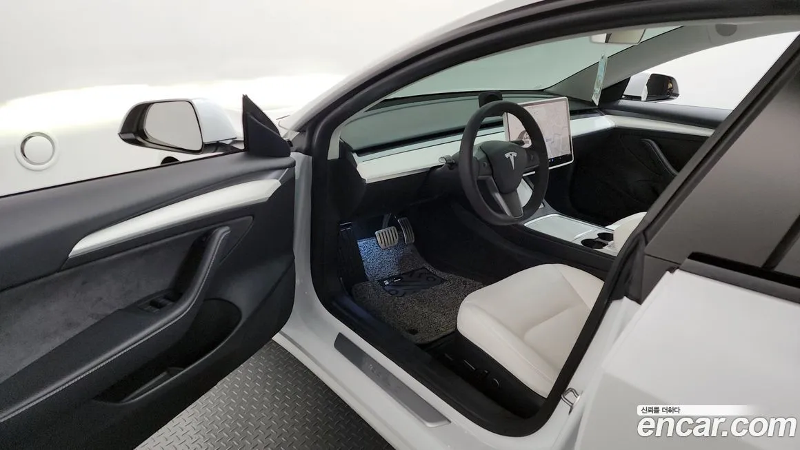 Tesla Model 3 — фото 7