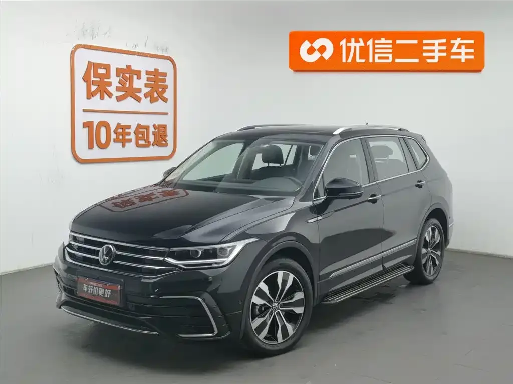 Volkswagen Tiguan L — фото 1