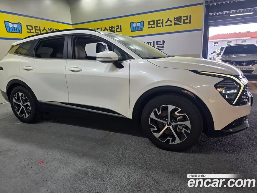 Kia Sportage — фото 9