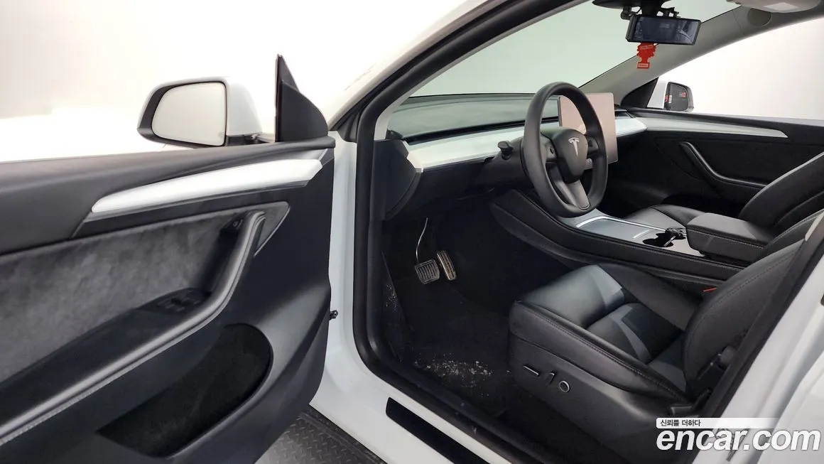 Tesla Model Y — фото 7