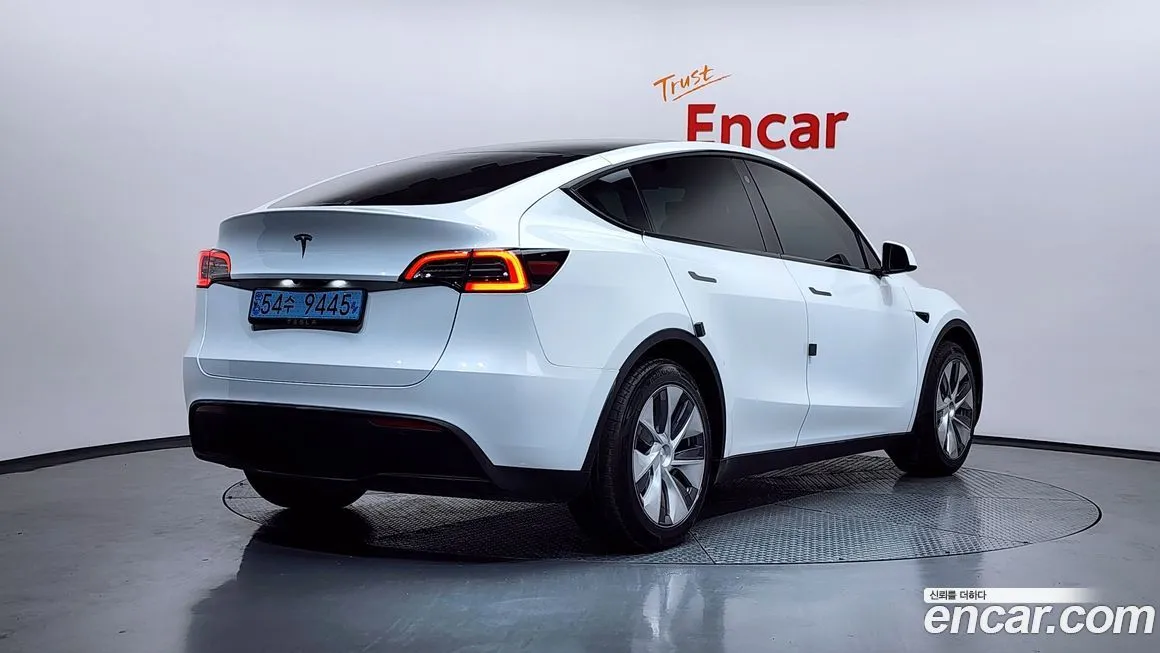 Tesla Model Y — фото 5