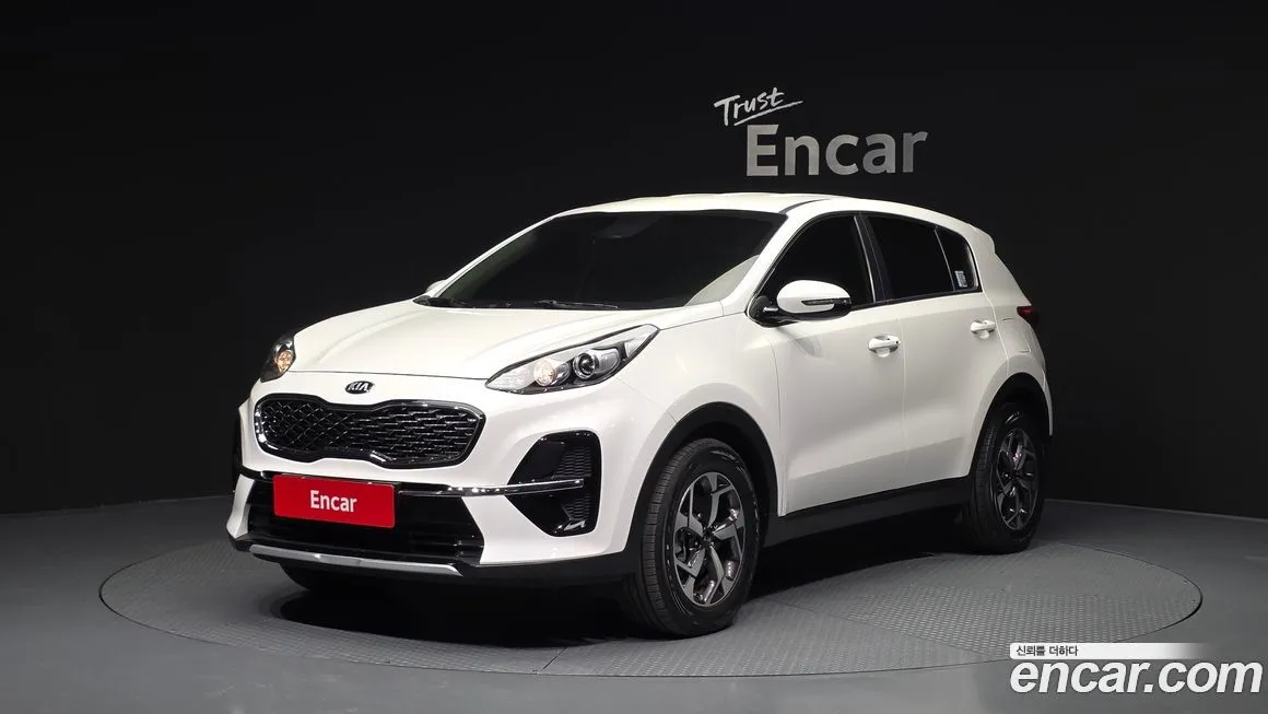Kia Sportage — фото 1