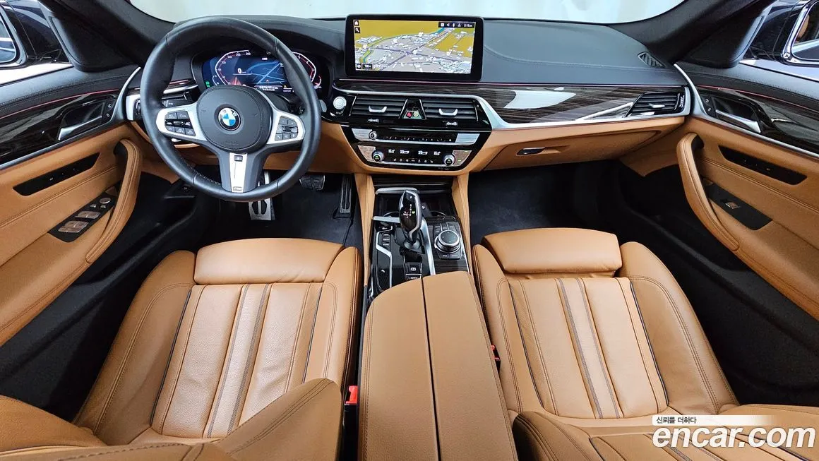 BMW 5-Series — фото 10