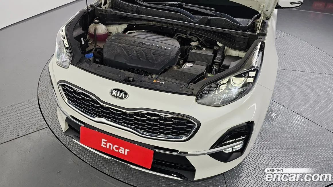 Kia Sportage — фото 8