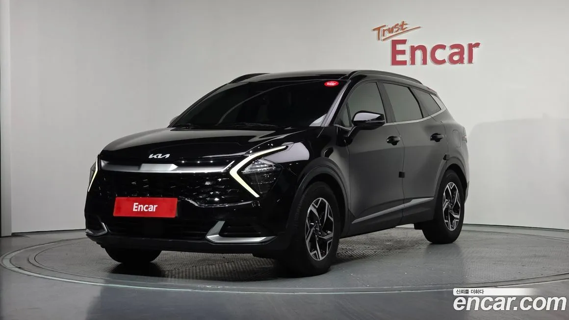 Kia Sportage — фото 1