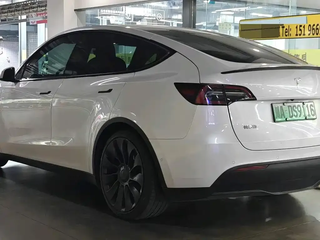 Tesla Model Y — фото 7