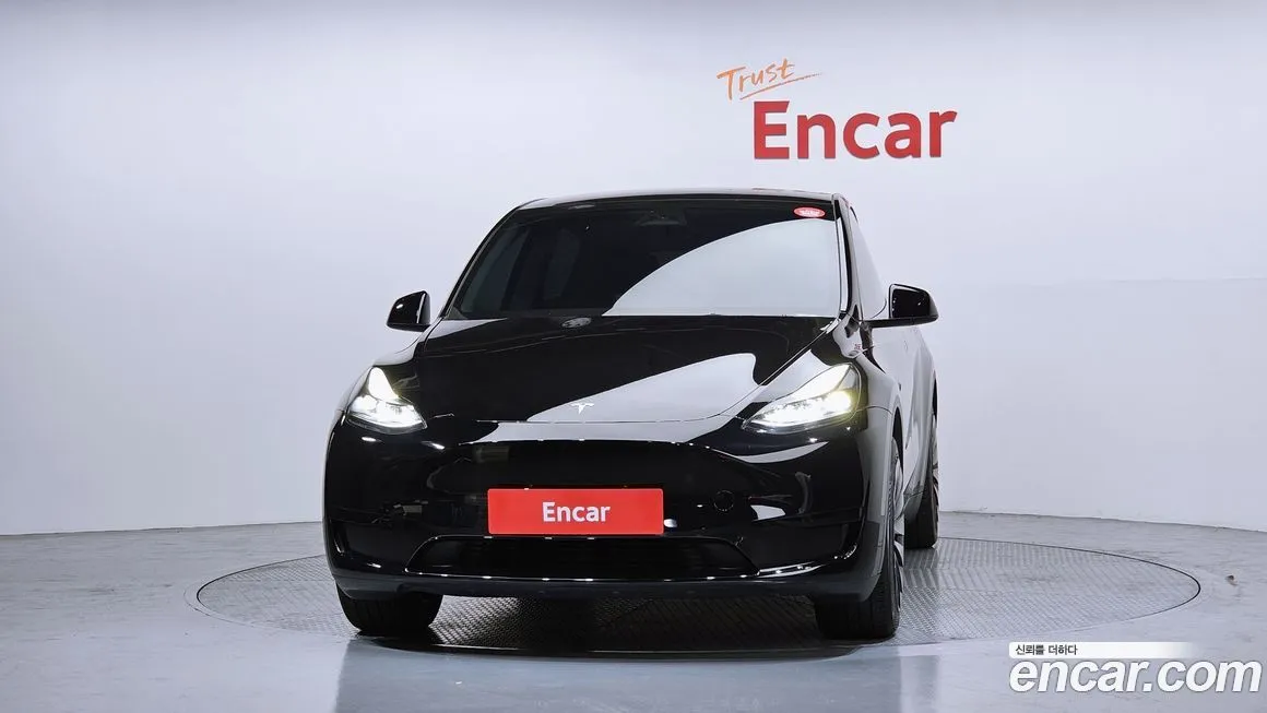 Tesla Model Y — фото 10