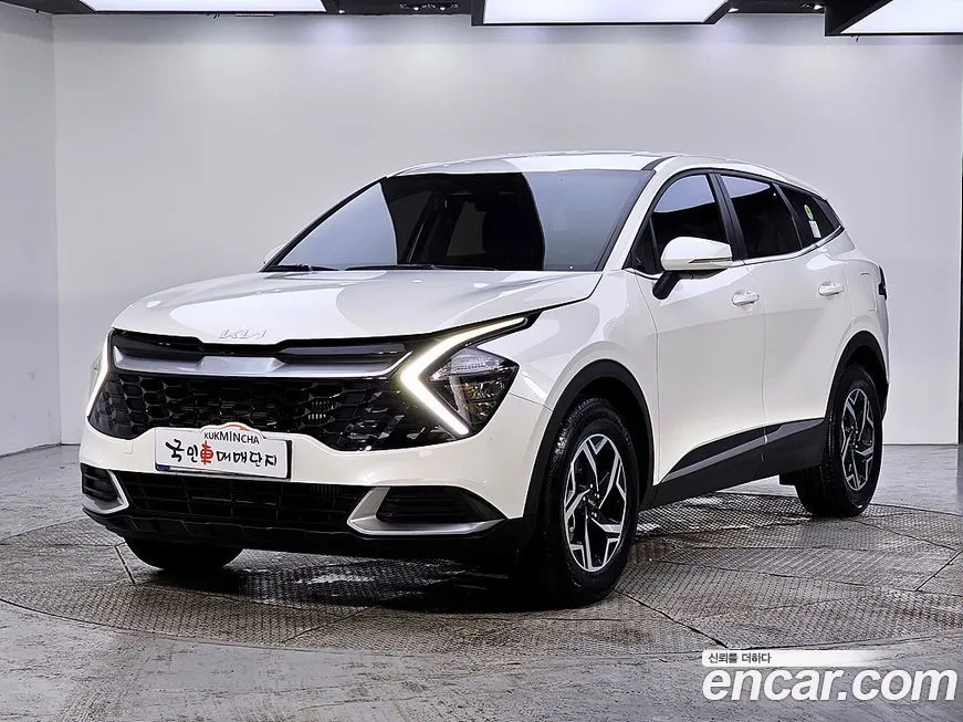Kia Sportage — фото 1