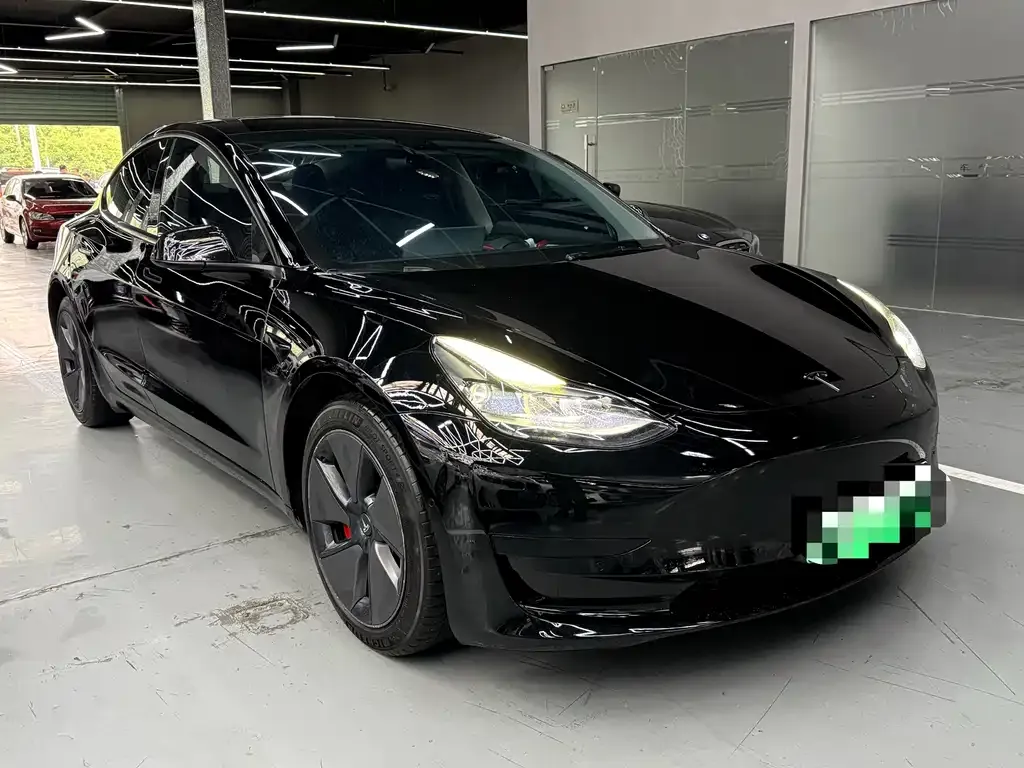Tesla Model 3 — фото 7