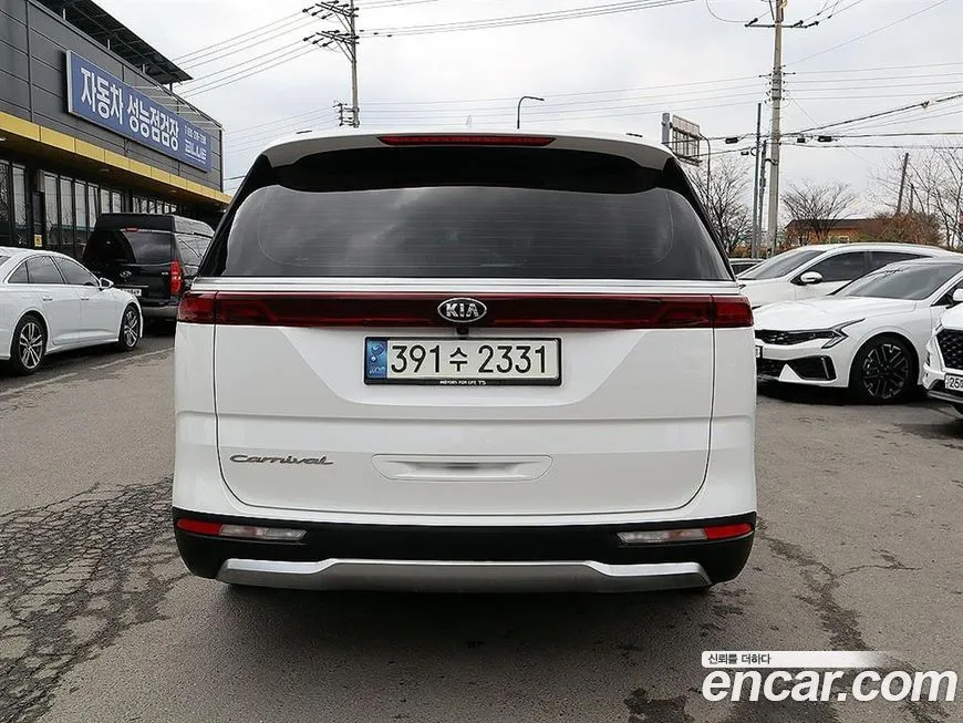 Kia Carnival — фото 5