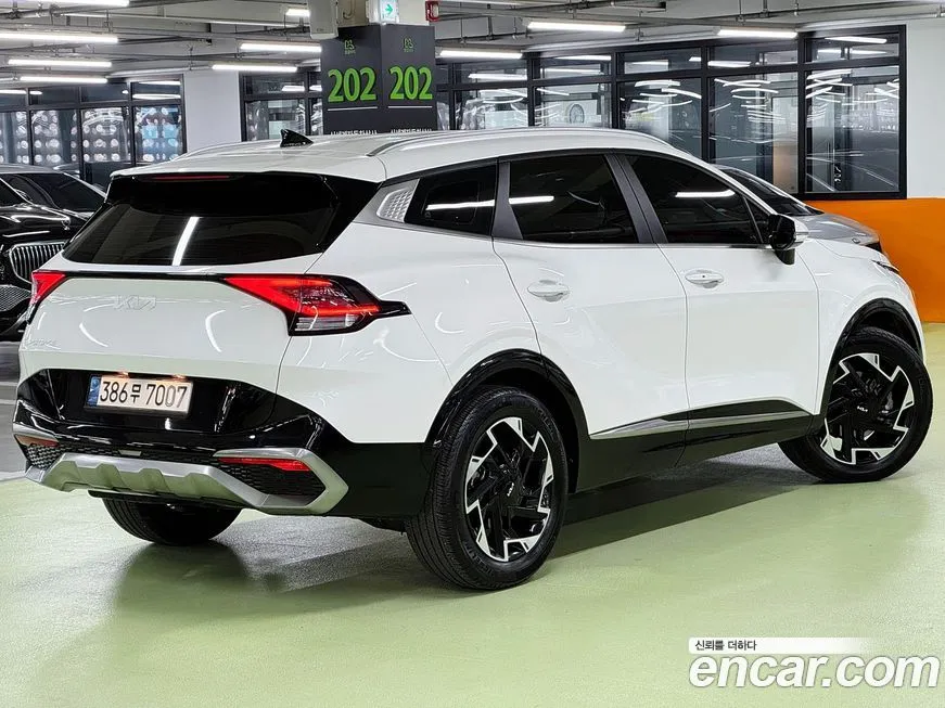 Kia Sportage — фото 7