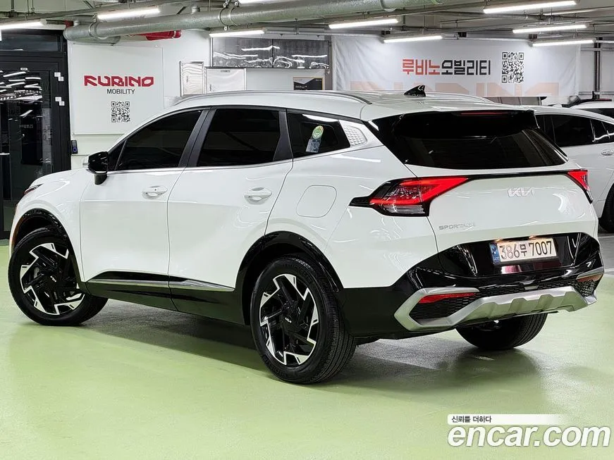 Kia Sportage — фото 10