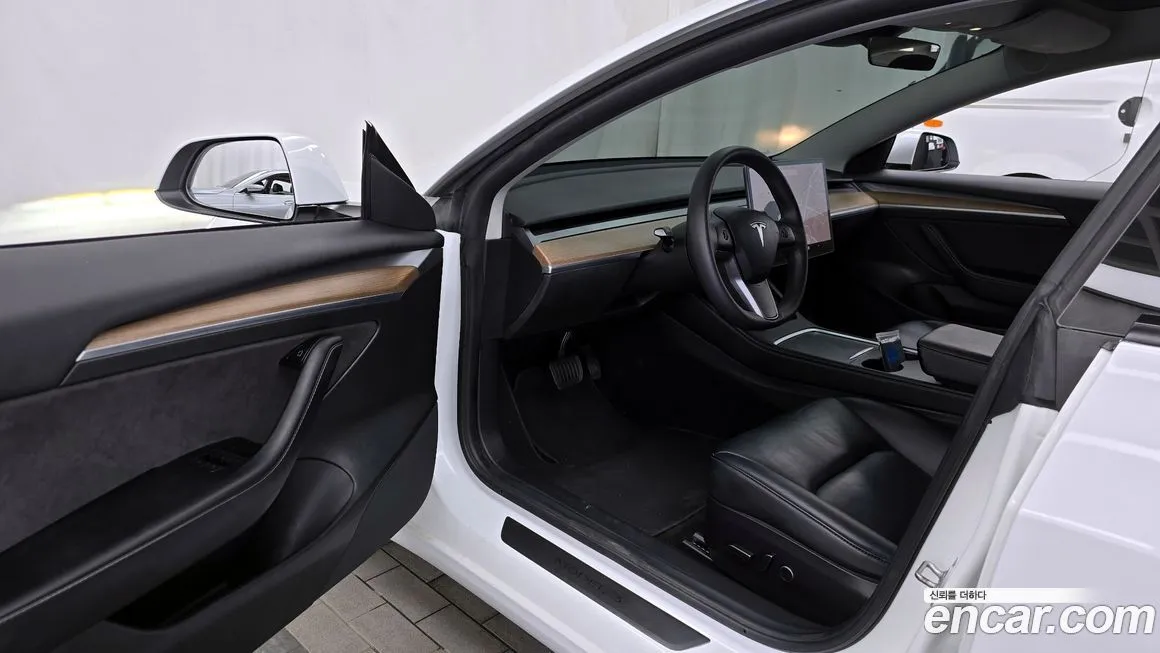 Tesla Model 3 — фото 4