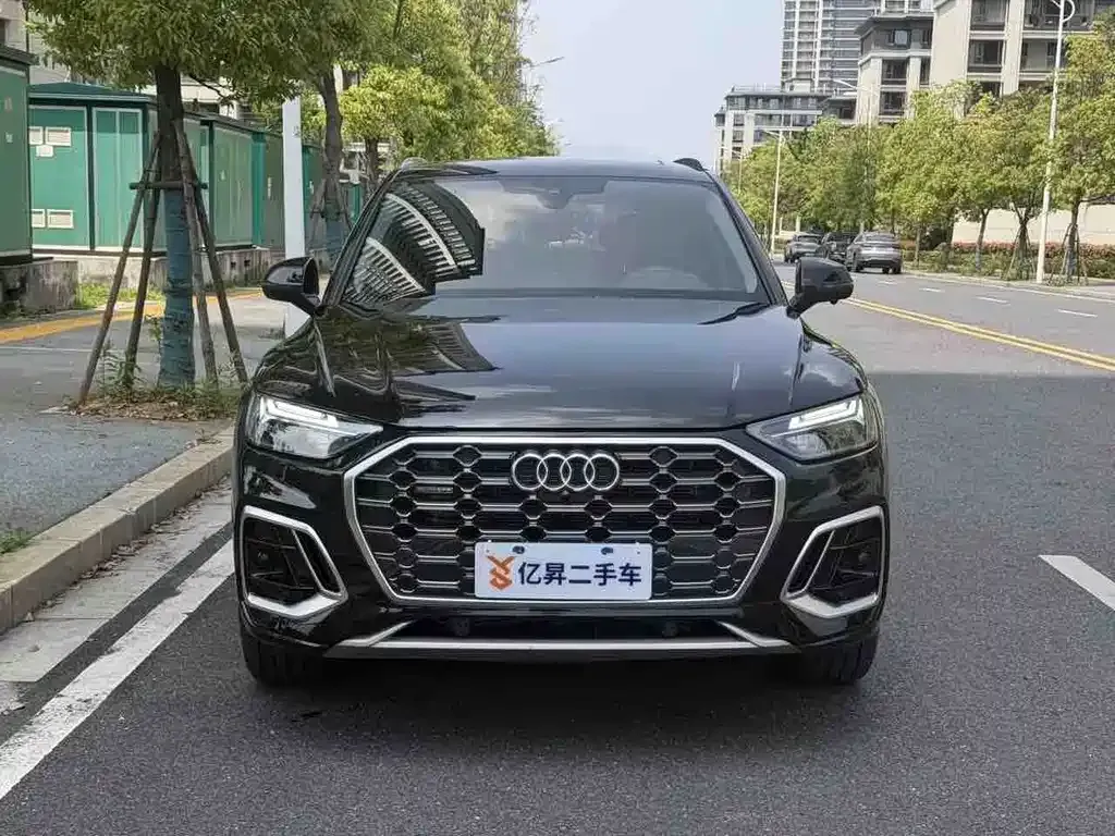 Audi Q5L — фото 7