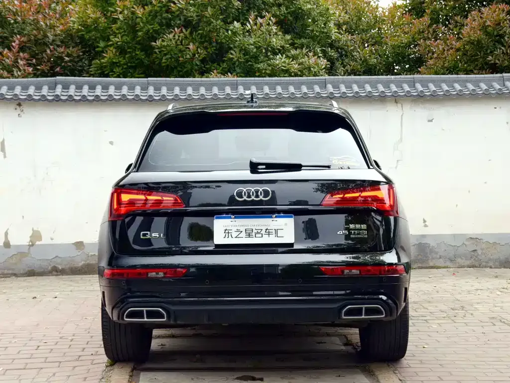 Audi Q5L — фото 10