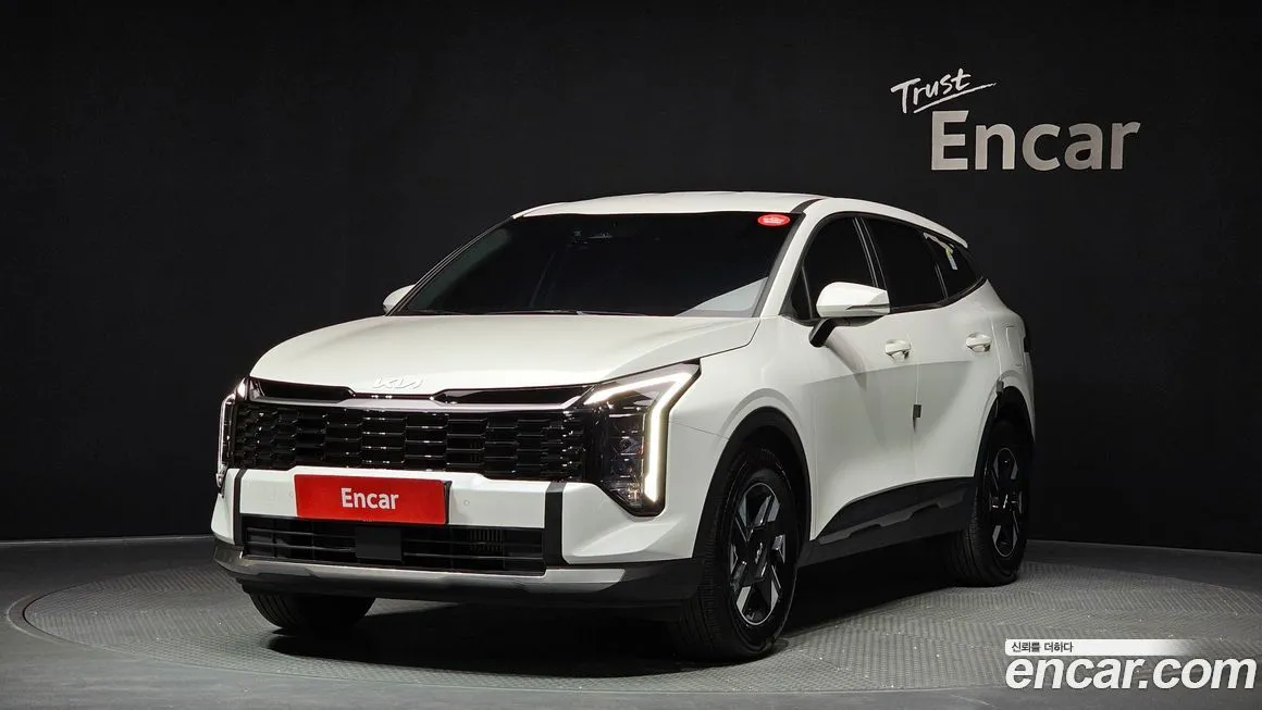 Kia Sportage — фото 1