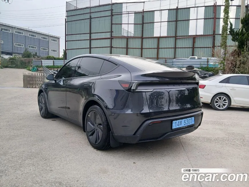 Tesla Model Y — фото 2