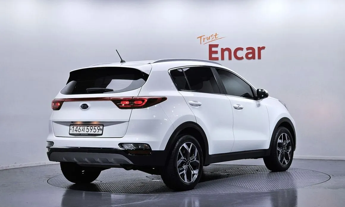 Kia Sportage — фото 9