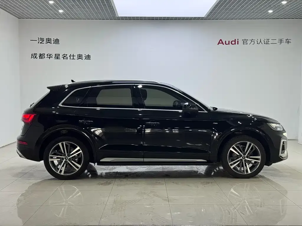 Audi Q5L — фото 5
