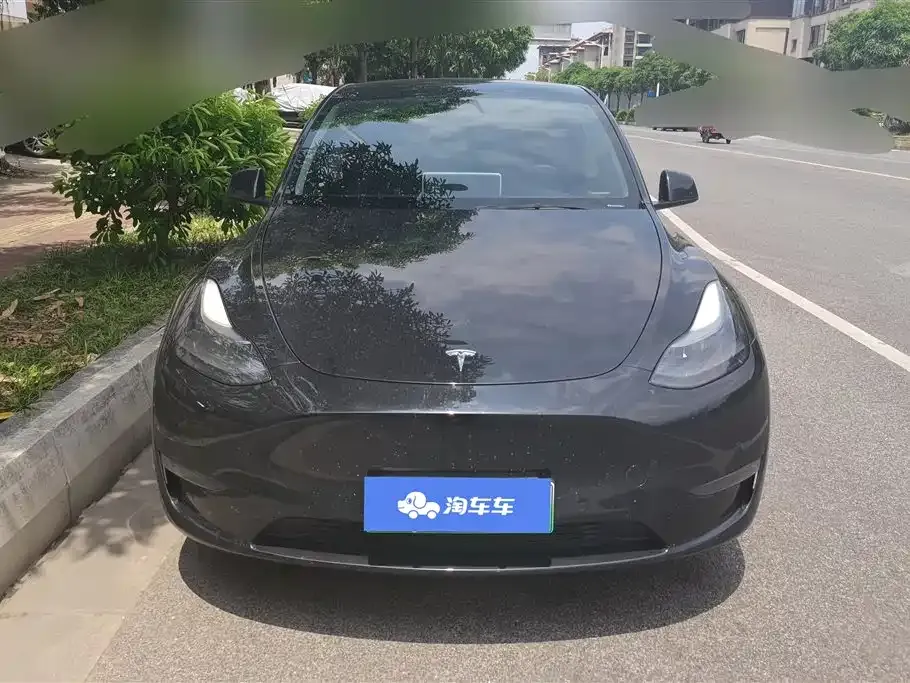 Tesla Model Y — фото 10